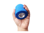 Hand Holding one Roll of WildCow 3 Inch Blue Vet Wrap