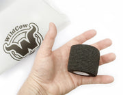 Hand Holding One One Roll of WildCow 2 Inch Black Vet Wrap