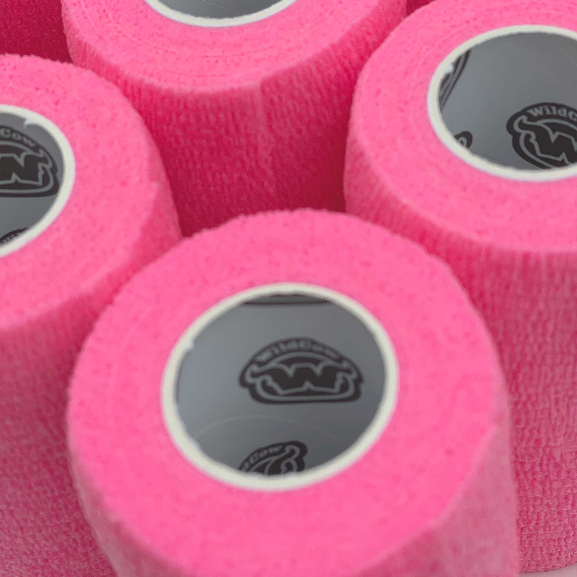 Rolls of WildCow Neon Pink Vet Wrap Bandage Tape