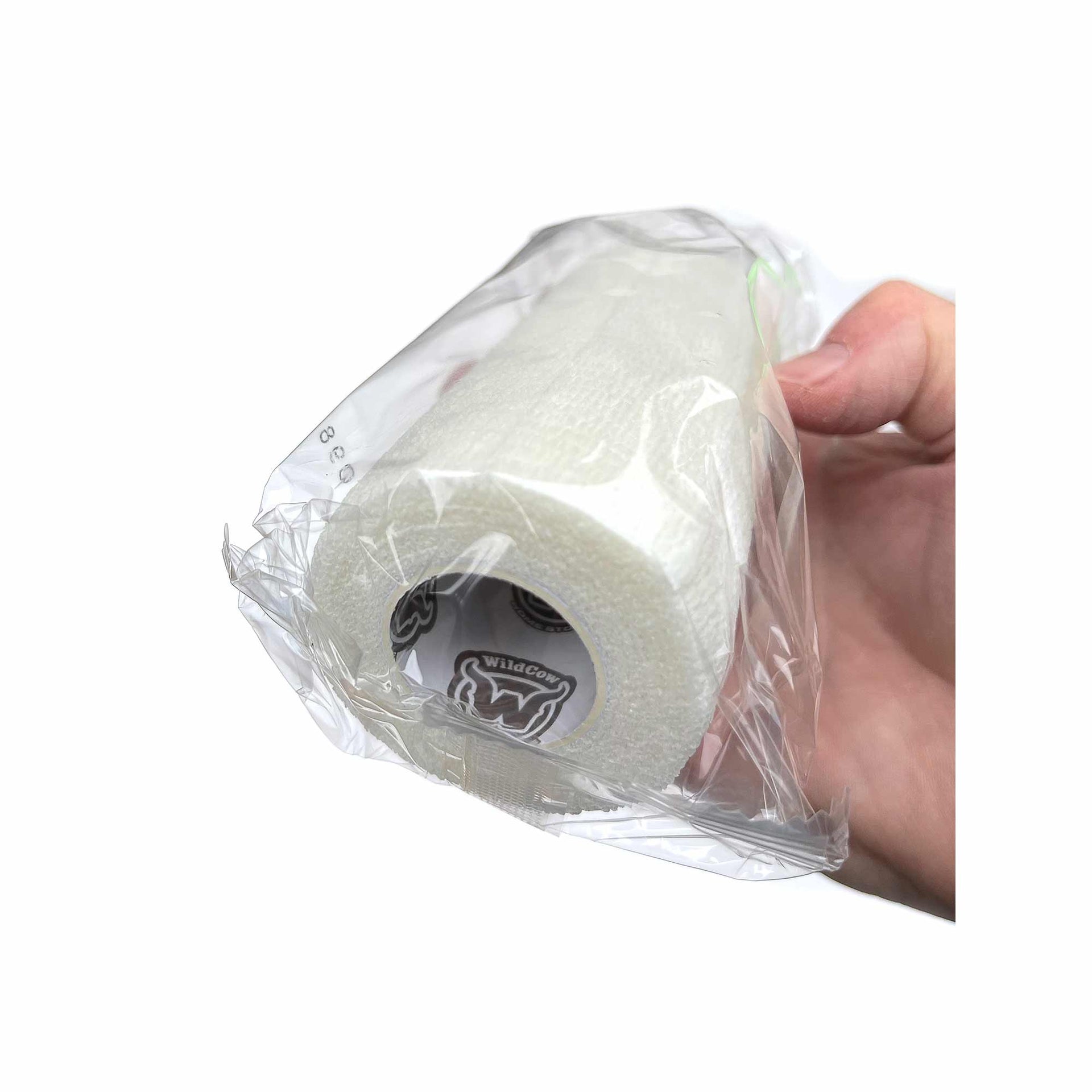 WildCow 4 Inch White Vet Wrap Roll Held in Hand